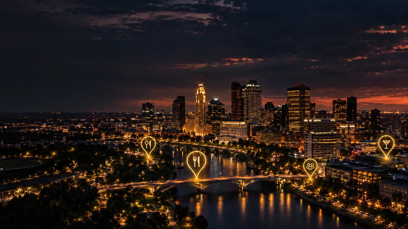 Columbus skyline at night with restaurant discovery locations highlighted